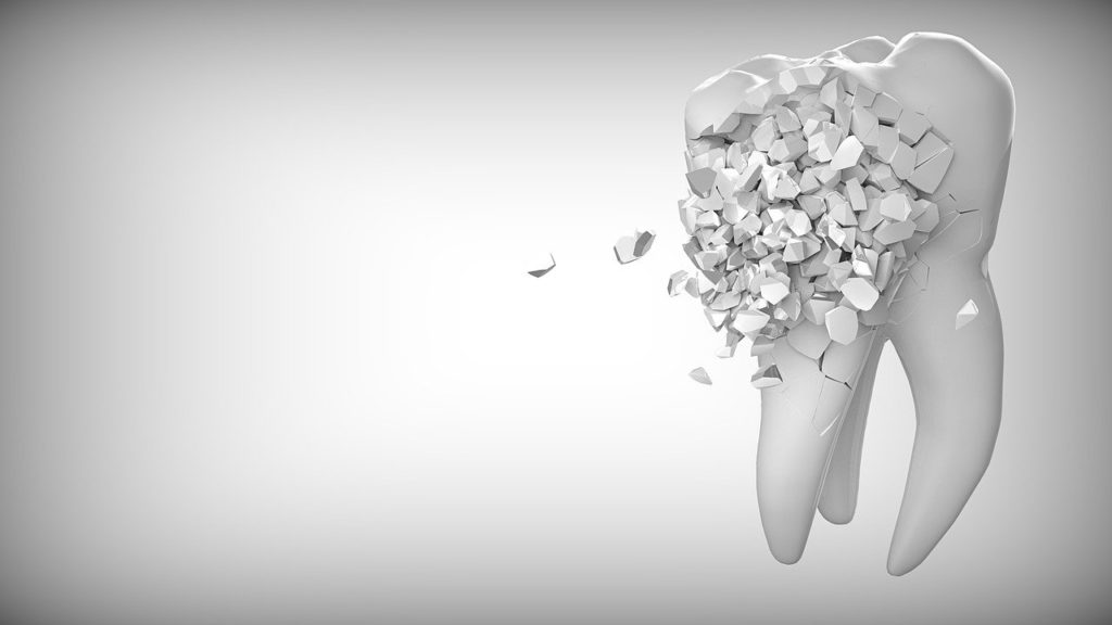 A broken, crumbling 3D tooth