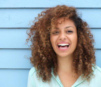 Cheerful young african woman smiling