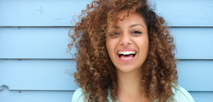 Cheerful young african woman smiling