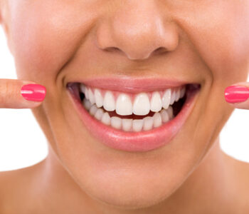 Woman showing her perfect teeth